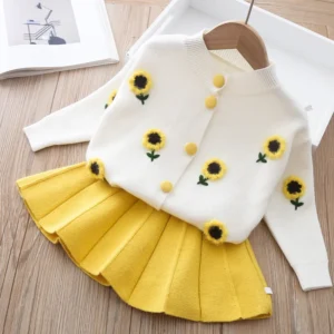 Ensemble tricoté tournesols avec jupe plissée jaune