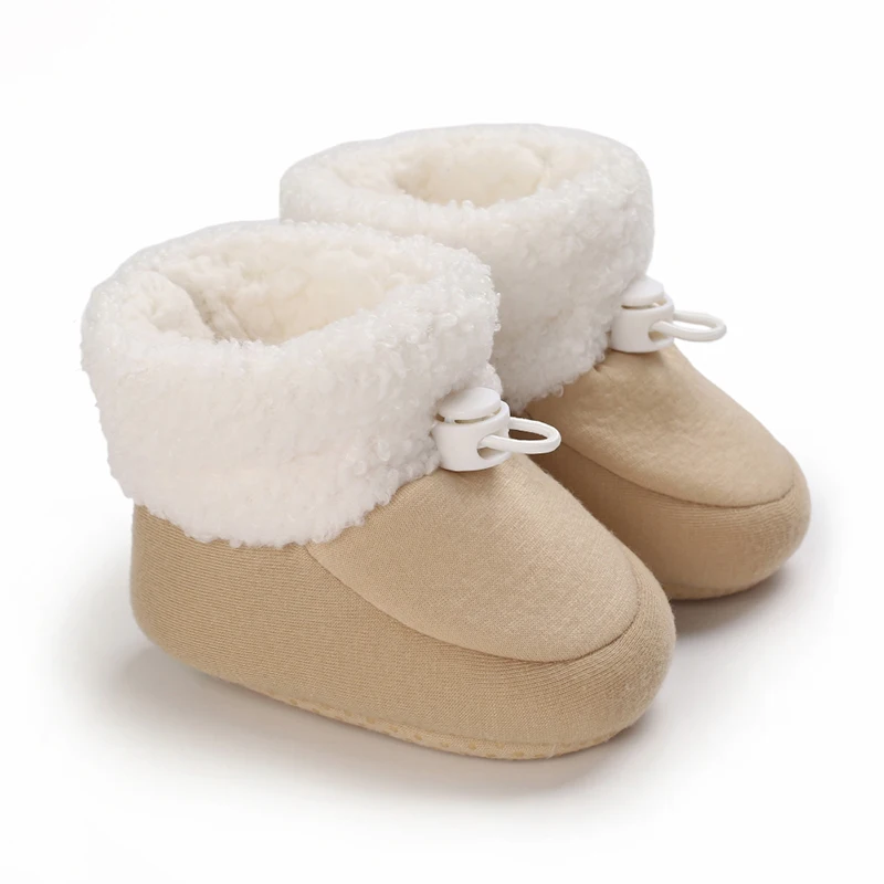 Bottine bébé beige à revers blanc moelleux