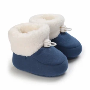 Bottine bébé d’hiver bleu nuit à revers blanc doux