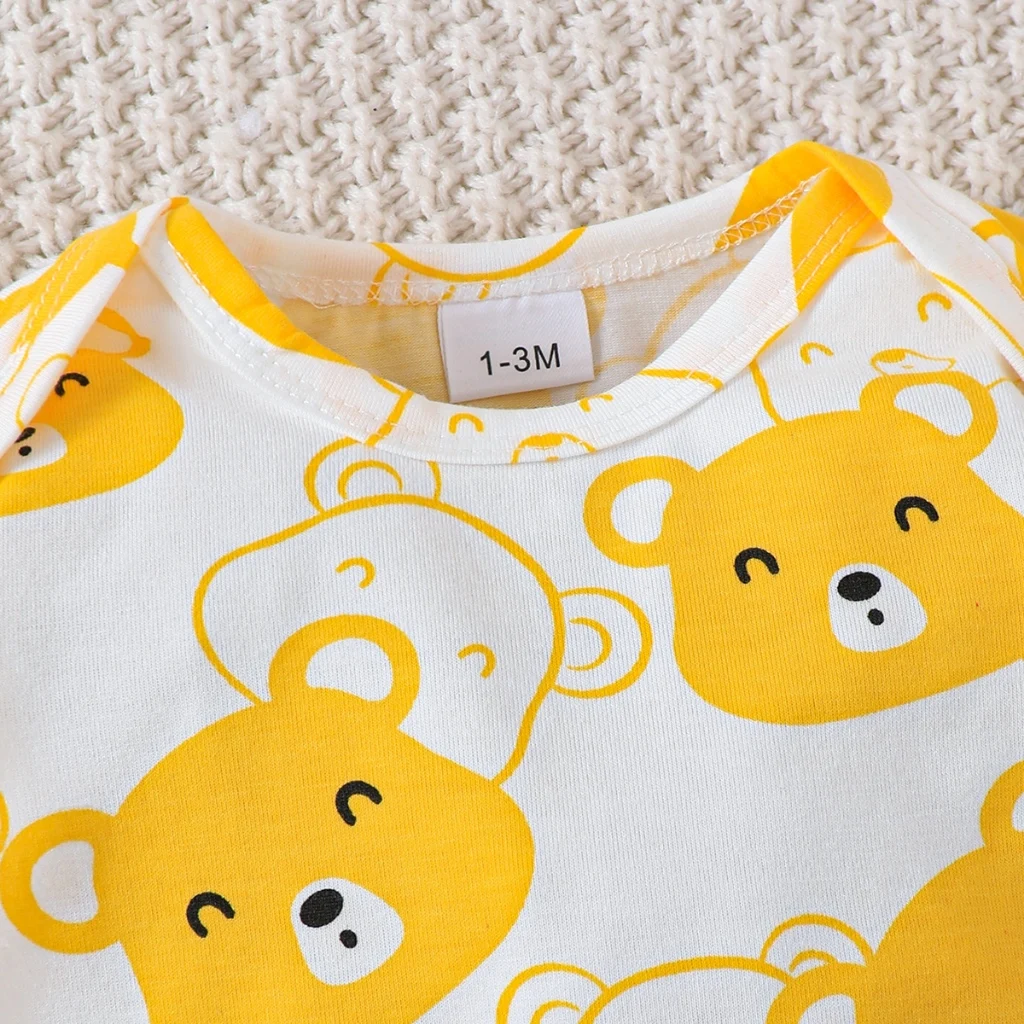 body ours jaune avec chapeau et pantalon pour bébé