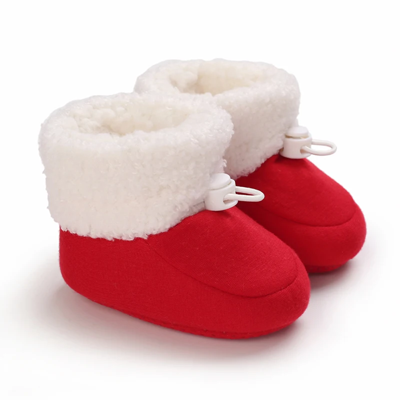 Bottine bébé d’hiver rouge à revers blanc douillet