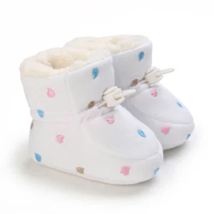 Bottine bébé blanche à pois pastel douillette hiver