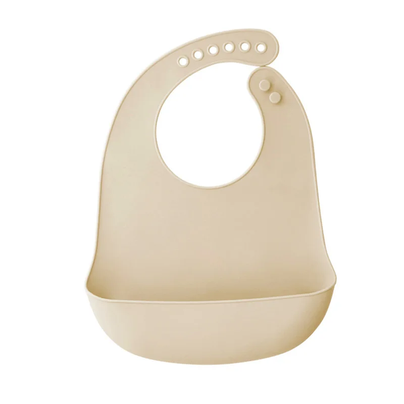 Bavoir bébé beige crème en silicone poche profonde
