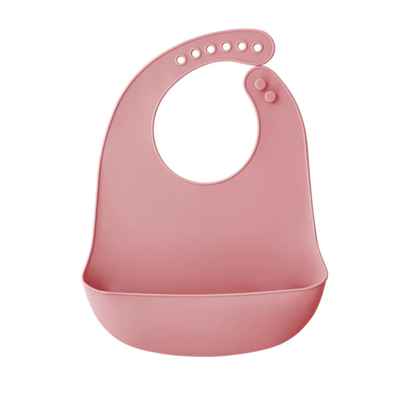 Bavoir bébé rose poudré en silicone poche profonde