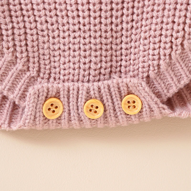 Barboteuse tricot rose élégante et bonnet pour bébé
