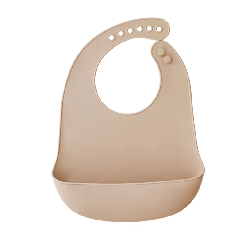 Bavoir bébé beige sable en silicone poche profonde