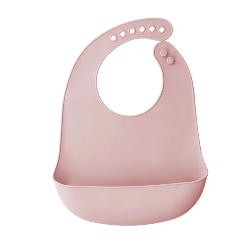 Bavoir bébé rose silicone avec poche récupératrice