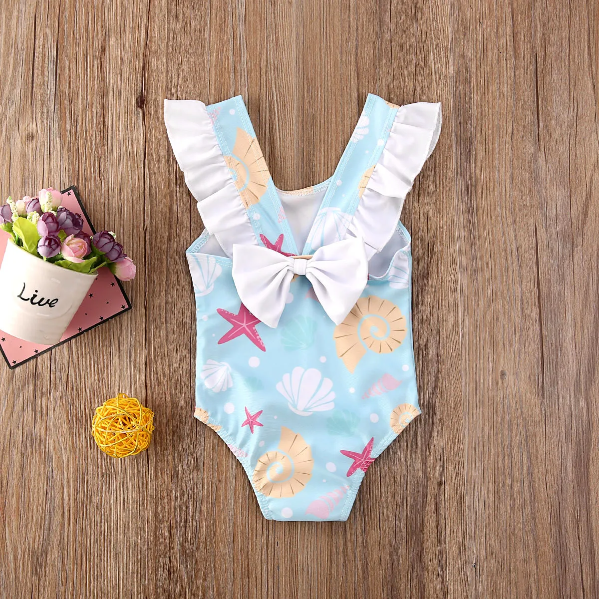 BodyBébé maillot coquillage dos nu à volants bleu ciel