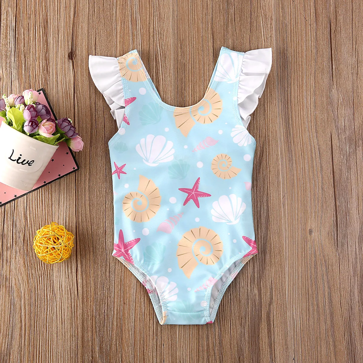 BodyBébé maillot coquillage dos nu à volants bleu ciel