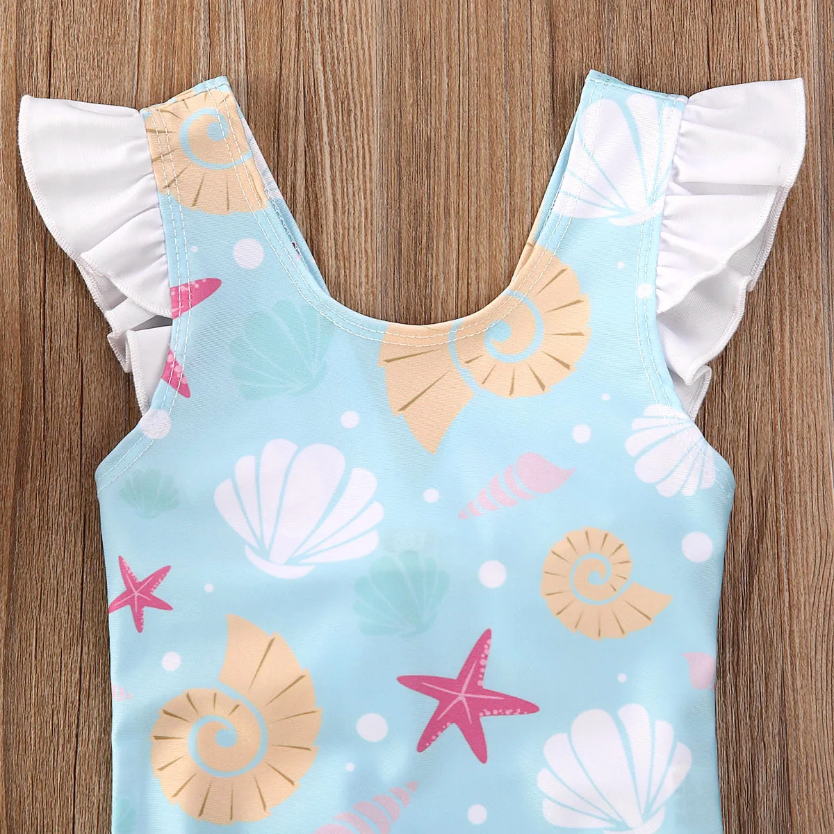 BodyBébé maillot coquillage dos nu à volants bleu ciel