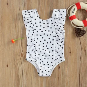 Maillot de bain bébé blanc à pois noirs une pièce volanté