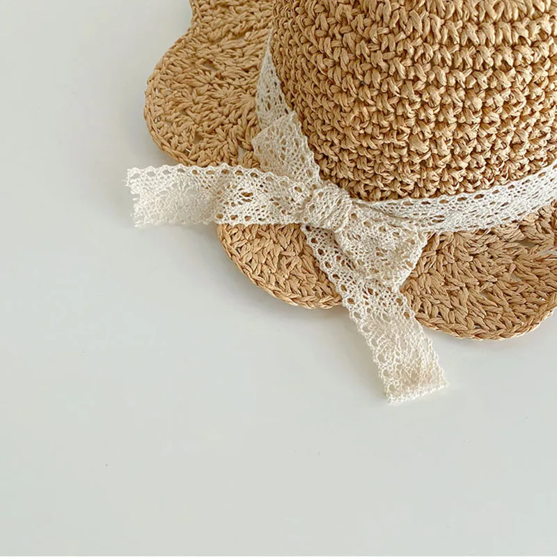 Chapeau bébé de soleil en paille à nœud dentelle