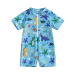 Maillot de bain bébé bleu anti UV dinosaures à manches courtes